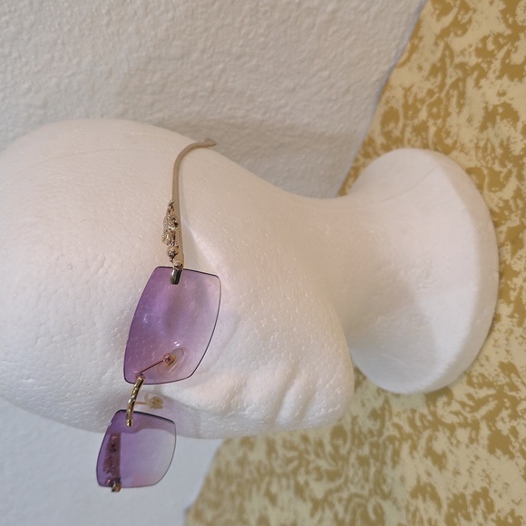 frameless sunglasses with a gold-finish metal frame and gradient purple lenses. - Picture 2 of 5